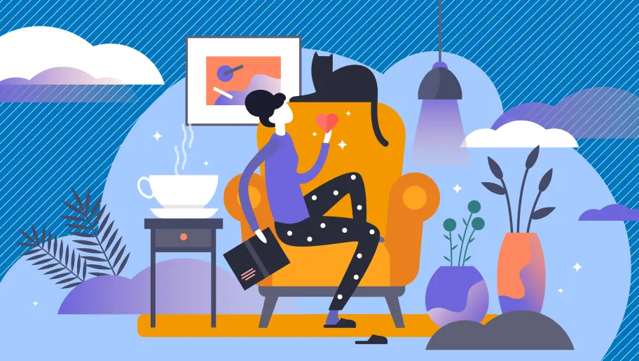 Frau mit Katze in einer gemütlichen Atmosphäre auf dem Sofa